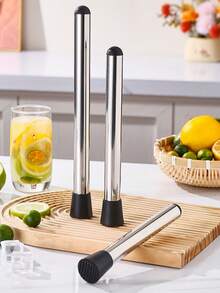 1 cái dụng cụ nghiền bằng thép không gỉ, dùng để xay sinh tố, trộn đồ uống, ép trái cây, nghiền chanh. - Xem 6