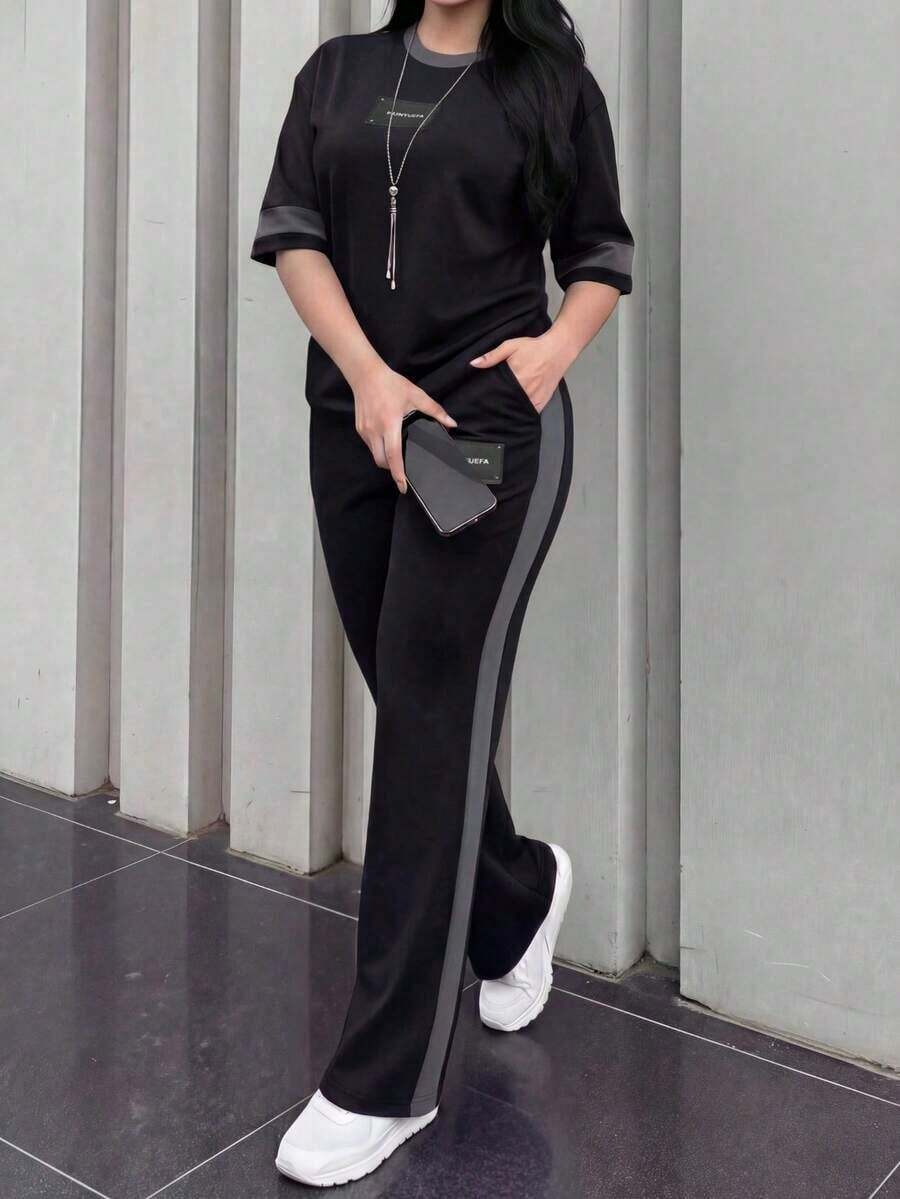 2 piezas Conjunto de camiseta de manga corta de cuello redondo y pantalones sueltos de cintura elástica para mujer, uso diario casual elegante de verano en color negro - Azul real 66 - Ver 1