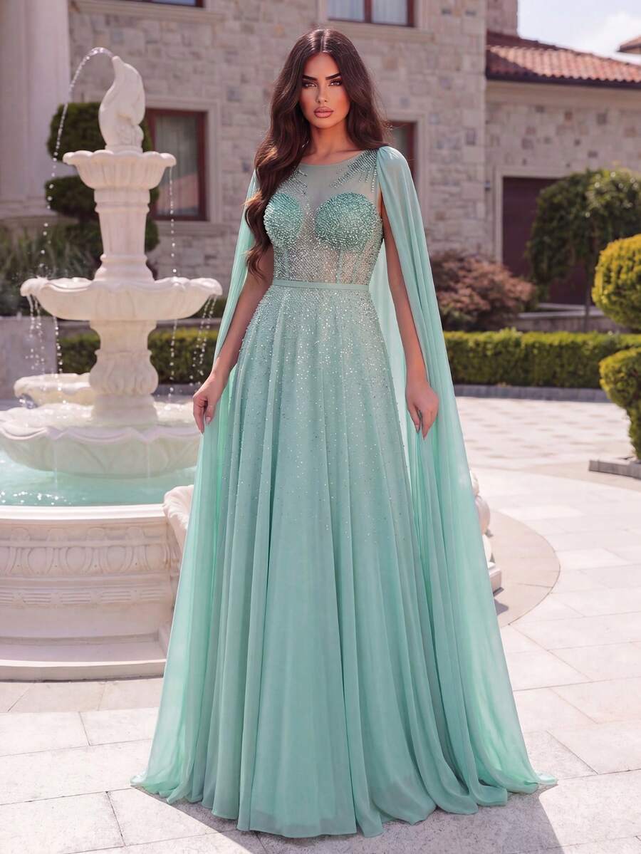 Faeriesty Abaya elegante con cuello redondo para vestido de noche formal, con capa y vestido de línea A fluido - una opción ideal para galas glamorosas, recepciones de bodas de lujo, eventos benéficos reconocidos y grandes bailes. Fiesta de primavera - verde menta - Ver 1