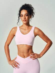 Bộ đồ thể thao không đường may, gồm quần yoga ống loe cạp cao và áo bra thể thao cổ chữ U. - Màu Hồng baby - Xem 5