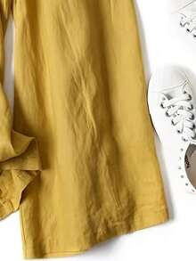 Pantalones anchos de primavera para mujer de unicolor, con bolsillo delantero decorado y estilo casual - Amarillo - Ver 5