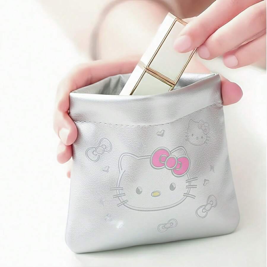 (授權) Sanrio Hello Kitty 金屬銀色擠壓收納包－迷你化妝包，方便的線材與耳機收納整理袋，可愛口袋錢包，適合女性