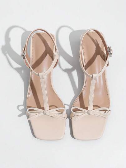 Giày sandal cao gót thời trang nữ hàng ngày với nơ và khóa cài.