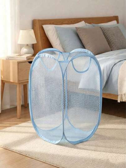 1 pièce Panier à linge pliable portable et respirant de style minimaliste - Résistant à l'humidité. Convient pour la maison, la chambre, la salle de bain et autres scénarios. Ce panier à linge présente un design de couleur unie avec des poches latérales, un accessoire de rangement essentiel pour les voyages, les activités de plein air et les déplacements professionnels.