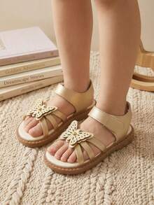 1 đôi sandal mùa hè màu vàng ánh kim cho bé gái, quai chéo, thiết kế hình bướm rỗng hai lớp, khóa dán, kiểu dáng công chúa, thời trang và đa năng, phù hợp cho vui chơi ở công viên và mang hàng ngày. - Hoa hồng vàng - Xem 3