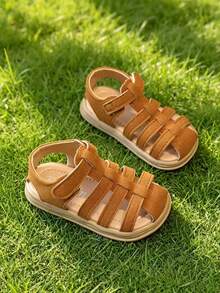 1 par de sandalias para niños con parte superior de PU, suela gruesa antideslizante, cierre de , nuevo diseño de punta cerrada 2026 para proteger mejor los pies de los niños, forro suave y transpirable, adecuado para caminar, jugar, playa, uso casual - Marrón - Ver 6