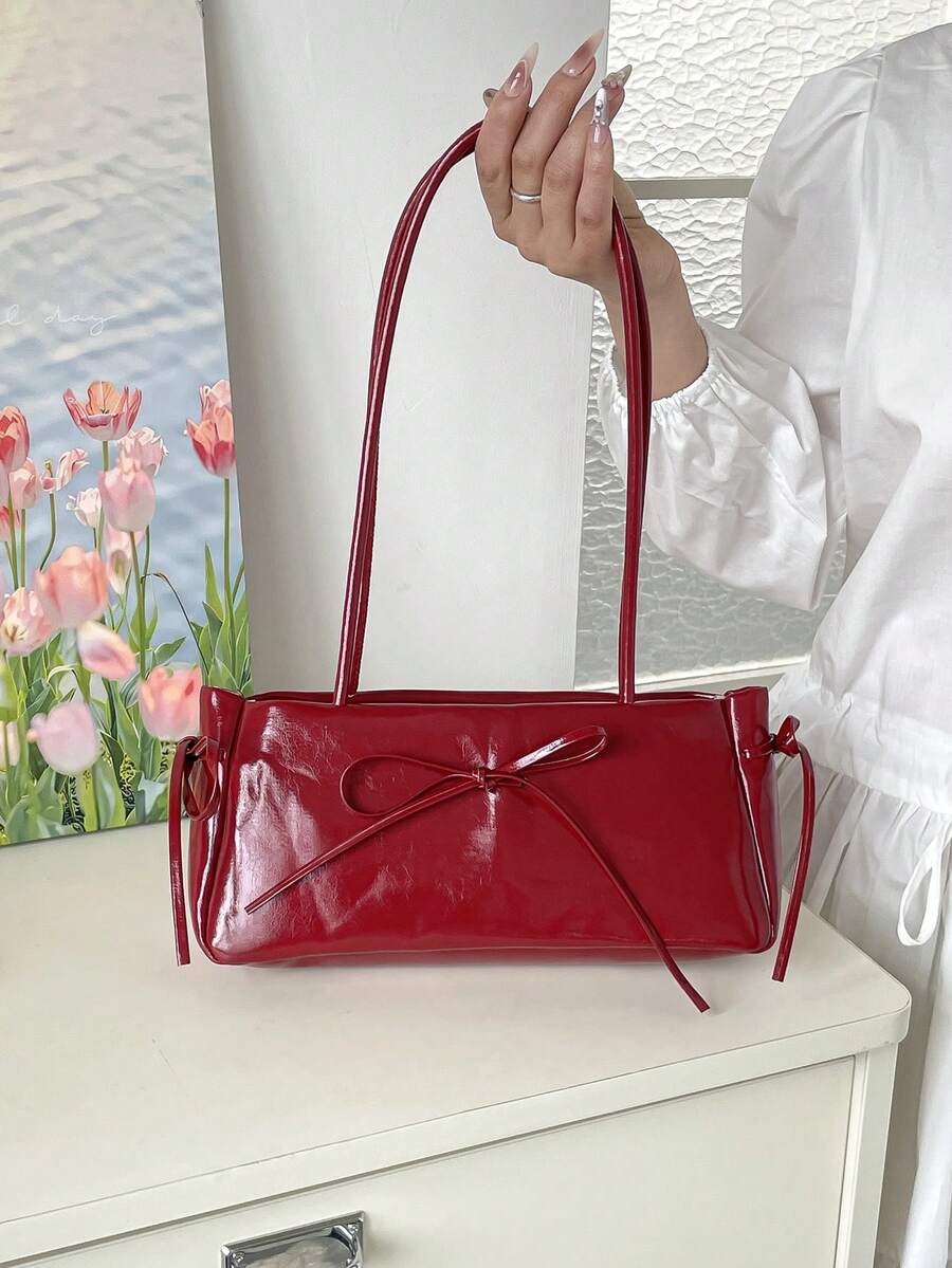 时尚精致简约风格女士大容量单肩包，2026新款包包。