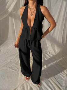 Conjunto de 2 piezas con top halter con lazos y espalda descubierta, y pantalones anchos con cordón - Atuendo para club, vacaciones, playa, festivales y Hawái para mujer - Negro - Ver 9
