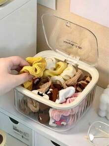 1 hộp đựng bằng nhựa trong suốt chống thấm nước có nắp - Hộp đựng hình chữ nhật đa năng dùng để đựng phụ kiện tóc, dây buộc tóc, kẹp tóc - Chất liệu bền, nhẹ, dạng túi, dùng để đựng phụ kiện tóc. - Trong sáng - Xem 10