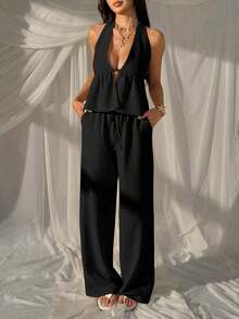 Conjunto de 2 piezas con top halter con lazos y espalda descubierta, y pantalones anchos con cordón - Atuendo para club, vacaciones, playa, festivales y Hawái para mujer - Negro - Ver 11