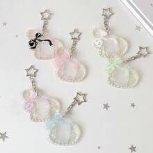 Móc khóa đựng ảnh kiểu Angel Secret - Thiết kế nơ dễ thương, chất liệu acrylic trong suốt lấp lấp, hoàn hảo để đựng ảnh và thẻ ảnh nhỏ. - Màu sắc - Xem 9