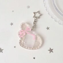 Móc khóa đựng ảnh kiểu Angel Secret - Thiết kế nơ dễ thương, chất liệu acrylic trong suốt lấp lấp, hoàn hảo để đựng ảnh và thẻ ảnh nhỏ. - Màu sắc - Xem 11
