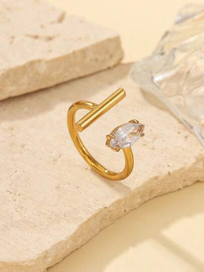 1 chiếc nhẫn hở bằng thép không gỉ màu vàng sang trọng, đính đá Zirconia trắng, thích hợp cho nữ giới đeo hàng ngày hoặc làm quà tặng.