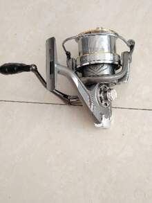 超轻远投纺车轮，铝合金线杯，不锈钢轴承，旋转式钓线轮，8000/9000/10000/12000/14000 型号，25KG 强力刹车力，适用于海水和淡水垂钓 - 銀色 - 查看 9