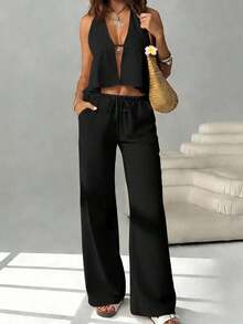 Conjunto de 2 piezas con top halter con lazos y espalda descubierta, y pantalones anchos con cordón - Atuendo para club, vacaciones, playa, festivales y Hawái para mujer - Negro - Ver 12