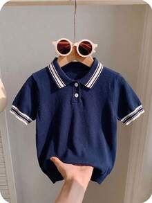 Camisa polo infantil masculina com gola em cores contrastantes, manga curta, malha fina, modelo pulôver, fechamento por botões, ideal para escola, uso diário, primavera, verão e outono. - Azul marinho - Ver 3