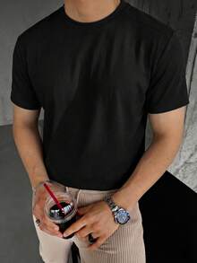 男士纯棉圆领短袖T恤，简约透气，亲肤舒适，柔软亲肤，低调复古风，可机洗，适合日常通勤、商务出行、户外活动等场合。 - 黑色 - 查看 2
