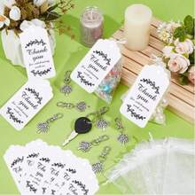 Bộ 30 móc khóa hình cây sự sống bằng hợp kim bạc cổ, có khóa càng cua xoay và vòng nối bằng sắt, bao gồm 10 móc khóa hình cây, 10 túi vải organza và 10 thiệp cảm ơn. Kích thước 2,36 inch, thích hợp để trang trí túi xách. - A - Xem 5