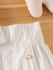 Conjunto de 2 peças para meninas, composto por regata listrada sem mangas e saia evasê, ideal para o verão. - Damasco - Ver 8