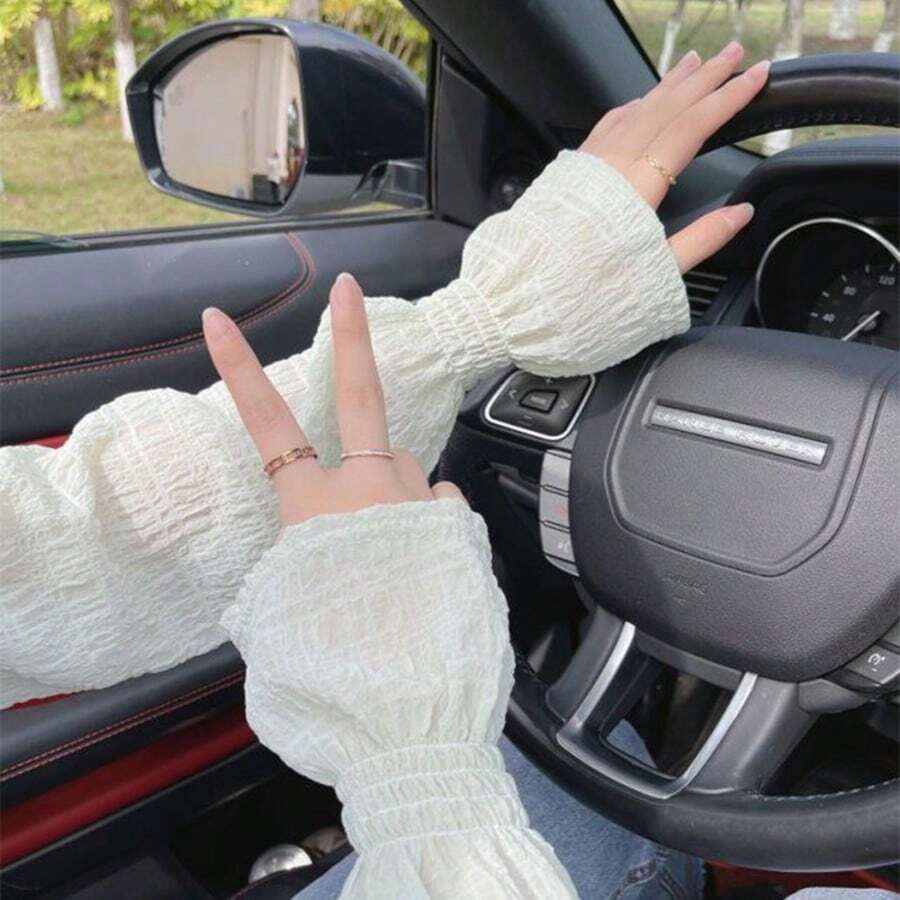 1 par de mangas largas de protección UV con textura de encaje para mujeres, cubiertas de sol transpirables y de enfriamiento sueltas para conducir, ciclismo y actividades al aire libre - A - Ver 1