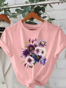 Camiseta de mujer de manga corta con cuello redondo, estampado floral en tonos morado, blanco y azul con pétalos en capas y centros dorados - PALO DE ROSA - Ver 7