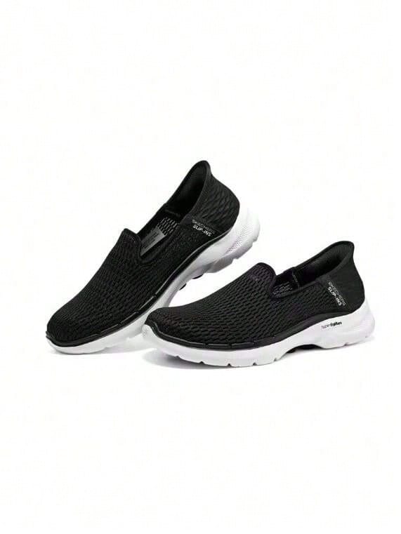 Skechers Comfortable Shock-Absorbing Casual Slip-On Walking Shoes - Black and White - View 1