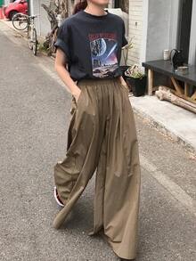 Pantalones de pierna ancha y holgada para mujer, incluyendo el estilo culotte negro, diseñados para la temporada de primavera. - Caqui - Ver 1