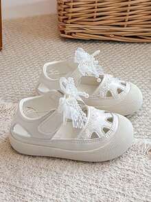 1 đôi sandal mùa hè thoáng khí cho bé gái, có nơ ngọc trai và dây buộc, đế mềm chống trơn trượt. - Màu be - Xem 2