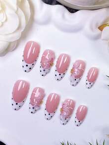 10 pièces de faux ongles en forme d'amande faits à la main, style français blanc avec des pois noirs et un design sculpté en 3D. Adopte une base d'ongle nude peinte à la main, assortie aux bords français blancs et aux pois noirs, et décoré de sculptures de fleurs à trois pétales faites à la main et de pistils. Élégant, romantique et minimaliste, ces patchs d'ongles de luxe, sexy et haut de gamme conviennent à la vie quotidienne, aux rendez-vous, aux concerts et aux occasions professionnelles légères, et constituent un excellent cadeau pour les femmes et les filles. - Multicolore - Voir 4