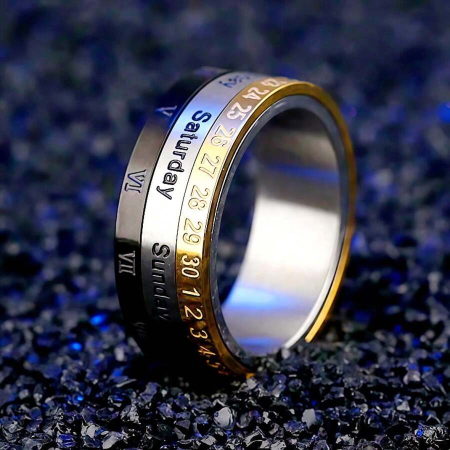 Anillo de calendario de acero inoxidable grabado con láser - Tabla de tiempo en números romanos, del lunes al domingo y visualización de la fecha, diseño ligero y duradero adecuado para el uso diario, cumpleaños, vacaciones - Accesorios de moda modernos y regalos prácticos, joyería exquisita - Calendario tricolor - Ver 1