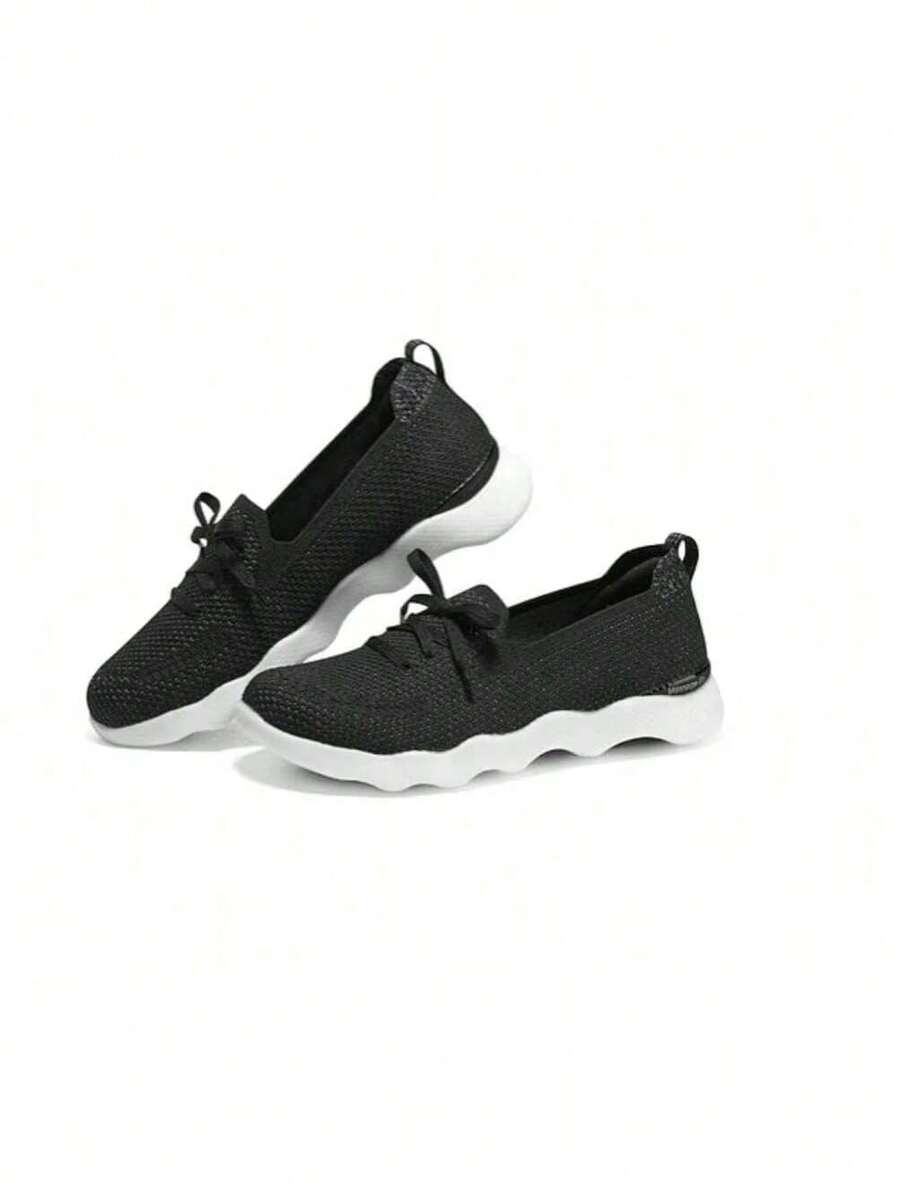 Skechers Women's Breathable Mesh Cushioned Slip-On Walking Sneakers - Black and White - View 1
