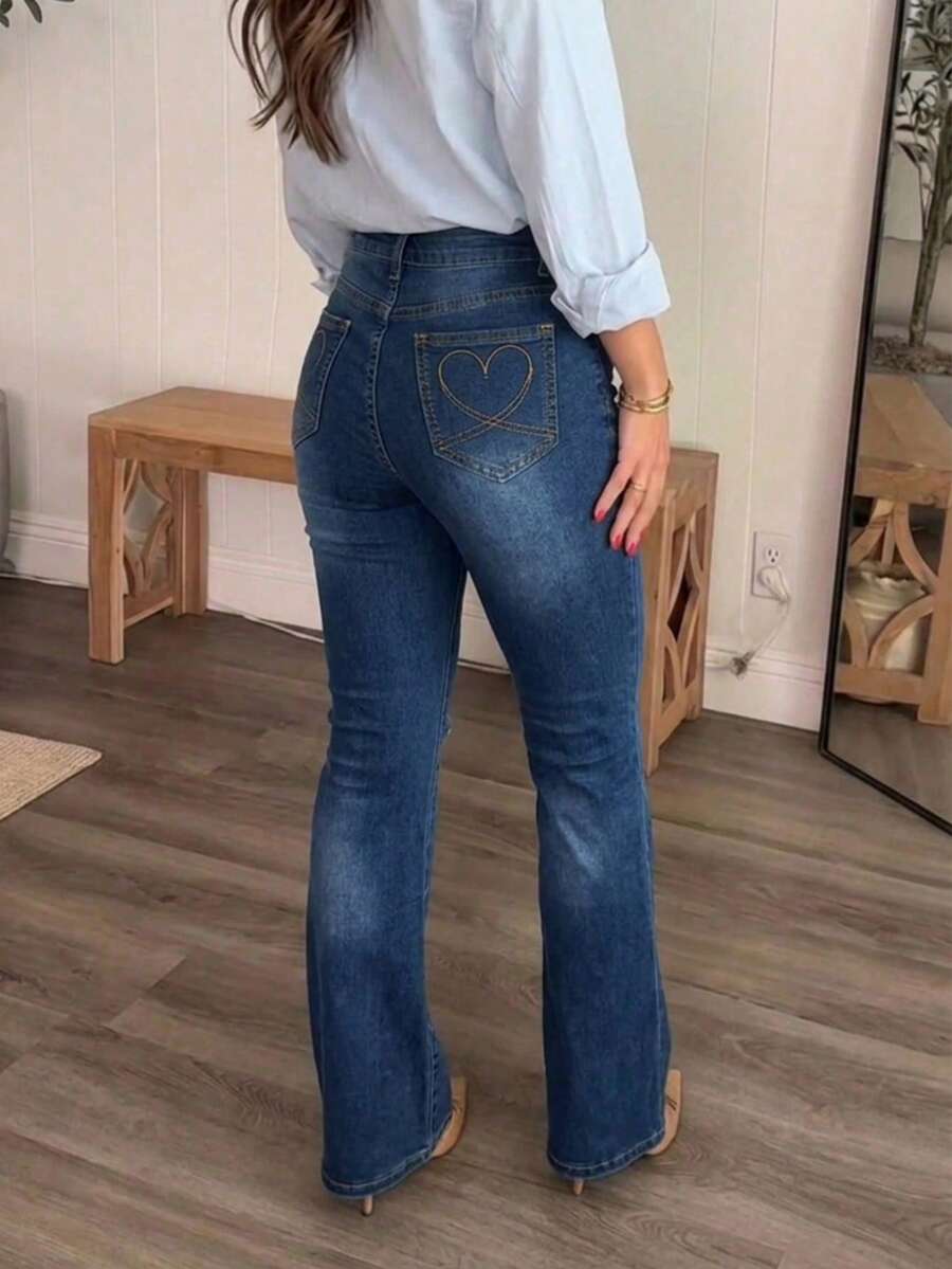 Jeans de mujer con efecto rasgado, elásticos y con vuelo casual - Azul lavado oscuro - Ver 1