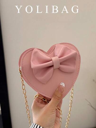 粉色蝴蝶结心形包，少女风链条斜挎包，适合约会，可装口红、耳机、钥匙等。
