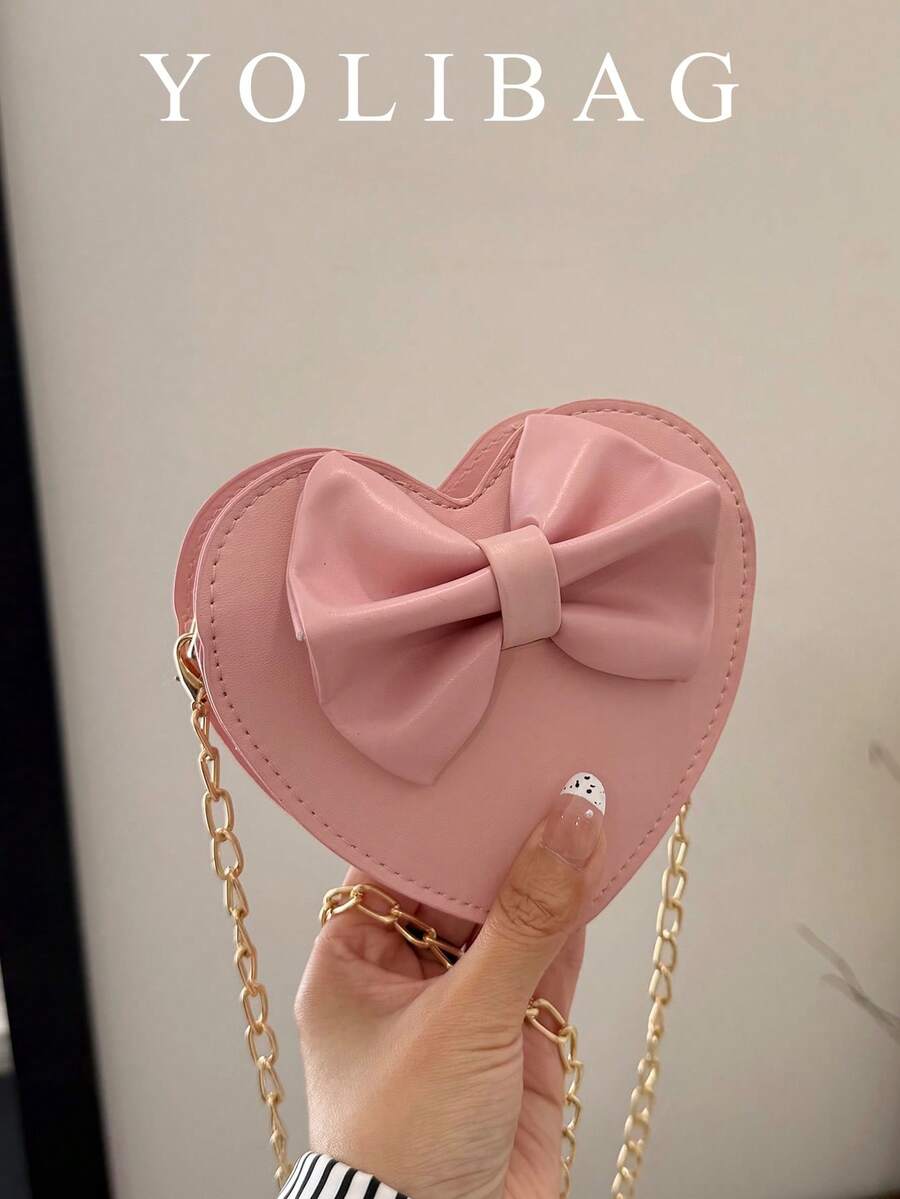 粉色蝴蝶结心形包，少女风链条斜挎包，适合约会，可装口红、耳机、钥匙等。
