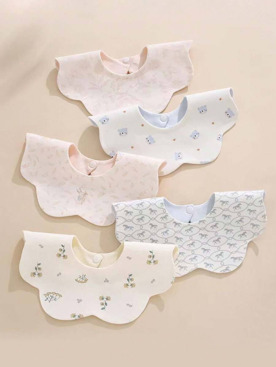 Bộ 5/3 chiếc yếm ăn cho bé bằng cotton hai mặt chất lượng cao, dễ thương, thiết kế cánh hoa xoay được. - Nhiều màu - Xem 1