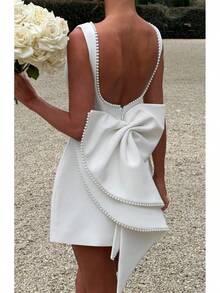 Women's Summer Pearl Bow Backless A-Line Mini Dress Sexy Slim Fit Party Wedding Guest Outfit 2026 Pearl Bow Backless A-Line Mini Dress Sexy Slim Fit Party Wedding Guest Outfit 2026 - trắng - Xem 2