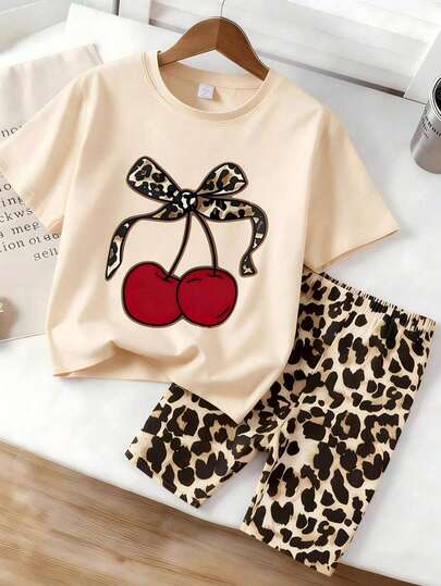 Girls' Summer Fashion Set, Beige Short Sleeve T-Shirt With Leopard Print & Cherry Pattern, Paired With Matching Leopard Print Sports Shorts, Loose Casual Versatile, Suitable For Daily Wear And School