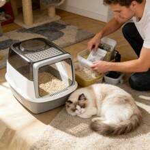 翻盖式封闭猫砂盆：多猫家庭的救星。采用翻盖式设计，双开口方便清洁。防溅设计有效防止猫砂溢出，显著提升养猫体验。 - 52*38*36CM - 查看 1