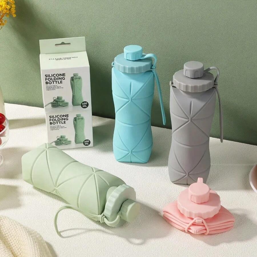 1件 600ml大容量可折疊矽膠杯，便攜式戶外旅行水瓶，多款清新顏色可選，可折疊設計，附蓋子與掛環，可拆卸杯口方便清洗，輕量且可重複使用，適合旅行、運動、野餐與學校，旅行必備用品