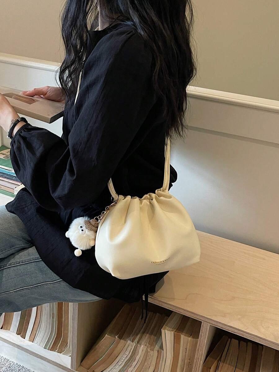 1件奶油色抽繩斜挎包,裝飾毛絨球,柔軟PU材質,休閒極簡風,適合女性日常與旅行 - 米色 - 查看 1