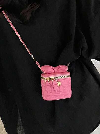 女士单肩包，蝴蝶结设计，绗缝拼接