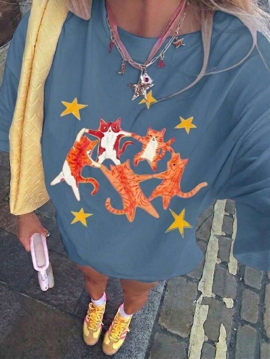 T-shirt vintage unisexe style années 2000 avec motif de chat dansant et d'étoiles, ample et confortable, adapté pour le port décontracté en été - Bleu gris - Voir 1