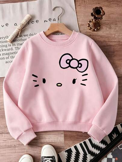  Sudadera minimalista de Hello Kitty de Sanrio. Top informal de cuello redondo para mujer. Estampado de gatito y lazo. Versión holgada y suave. Ideal para primavera, otoño e invierno.