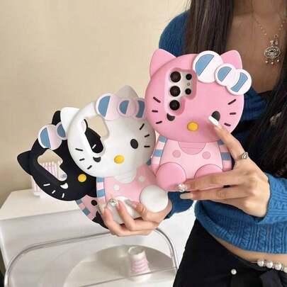 SANRIO 1 chiếc ốp lưng điện thoại Hello Kitty ngồi thời trang, sáng tạo, có sẵn màu hồng, đen và trắng, thiết kế nơ sọc, thân thiện với da, hiệu ứng 3D nổi, chất liệu silicon chống nước và chống sốc, dễ thương và phong cách, phù hợp với dòng 17, 11/12/12 Pro, 13/14/15, 13 Pro/14 Pro/15 Pro, 12 Pro Max/13 Pro Max/14 Pro Max/15 Pro Max, 16, 16 Pro, 16 Pro Max, 17, 17 Pro, 17 Pro Max. Món quà tuyệt vời cho Ngày của Mẹ, Lễ hội Thuyền Rồng, Lễ hội Nước.