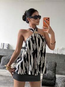 Áo hai dây hở lưng họa tiết da báo sành điệu với điểm nhấn là vòng cổ kim loại. - Đen và trắng - Xem 3
