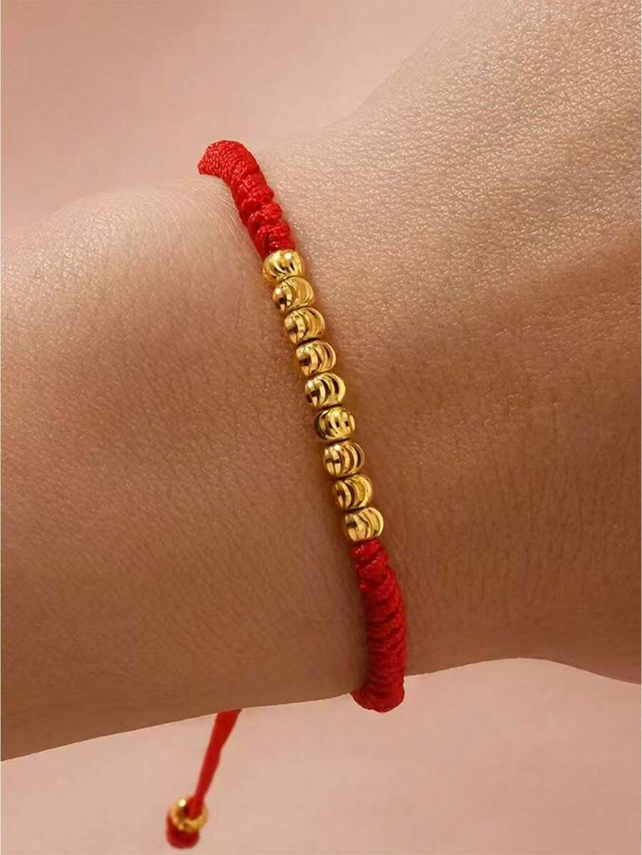 1 chiếc vòng tay điều chỉnh được, làm từ sợi ngọc bích, đính hạt hình hoa cắt vàng 4mm. - Đỏ - Xem 1