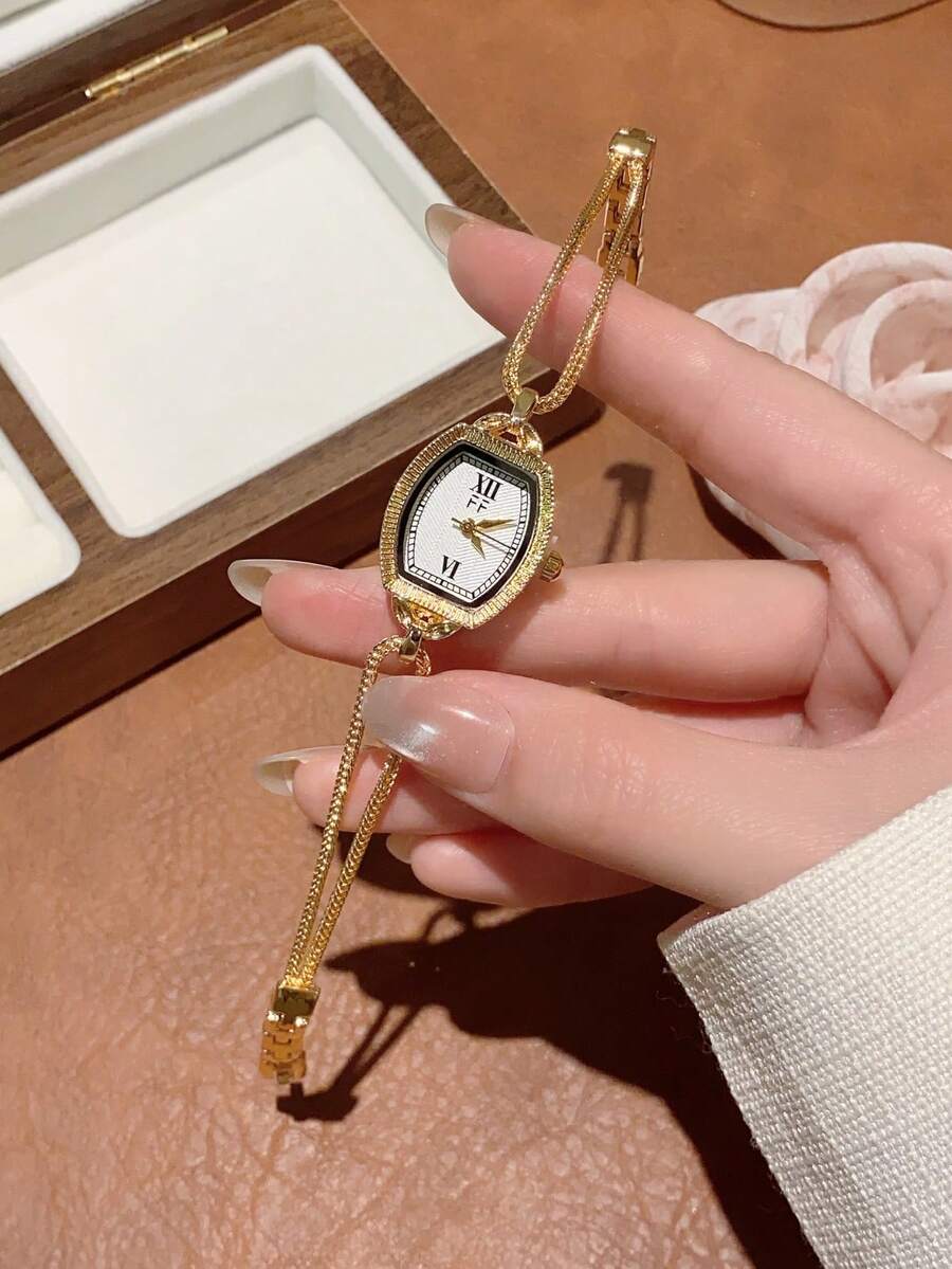 1 件女士金色椭圆形石英表,优雅时尚,适合日常佩戴、生日、毕业礼物、休闲聚会和派对。 - 金色 - 查看 1