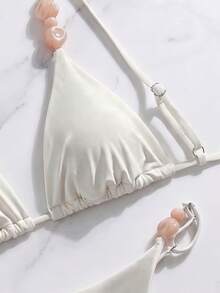 Bộ bikini cổ yếm màu trắng đính ngọc trai, kiểu dáng thanh lịch, gợi cảm, thời trang thường ngày, thích hợp cho nữ, đi biển hoặc dự tiệc mùa xuân/hè. - trắng - Xem 4