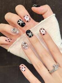 10 pièces Ongles courts ronds faits à la main pour les fêtes et le port quotidien, ongles noirs, œil de chat brillant, imprimé léopard noir et rose, strass pailleté, style doux et cool, ongles ovales, brillants et étincelants, faciles à porter. 10 pièces d'ongles faits à la main Y2K, convient pour les filles et les femmes, festivals, fêtes et port quotidien - Noir - Voir 3