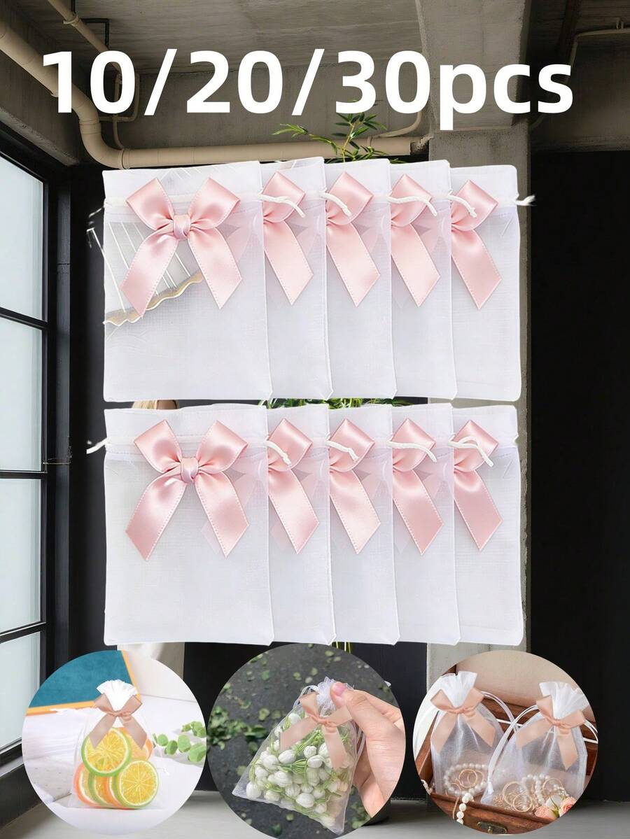 30 chiếc/20 chiếc/10 chiếc Túi vải organza màu sâm panh có nơ, túi đựng trang sức organza 3.5x4.7 inch, túi dây rút, túi quà cưới, túi đựng quà tặng, đồ dùng gia đình, túi đựng đồ bằng nylon, đồ dùng tiệc tùng ngày lễ, đồ dùng đám cưới, bao bì trang trí quà tặng, túi đóng gói nhỏ, quà tặng số lượng lớn ngày Valentine, túi quà tặng tiệc, túi dự tiệc, túi organza Giáng sinh, túi quà nhỏ, túi đựng trang sức, túi dây rút mini, túi lưới, thích hợp làm quà tặng tiệc cưới, bao bì quà Giáng sinh, quà năm mới. - Nơ màu sâm panh bằng vải organza trắng. - Xem 1
